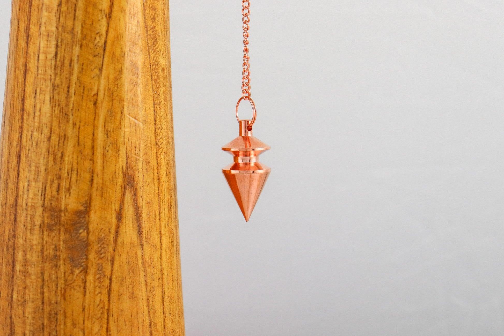 Pendule Triangle - Laiton cuivré